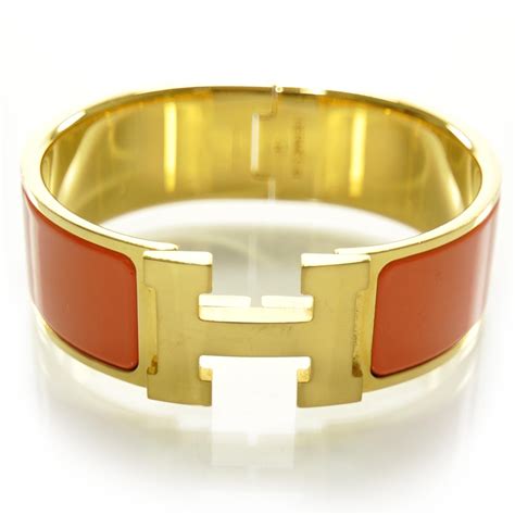 hermes bracelet orange gold|Hermes orange enamel bangle bracelet.